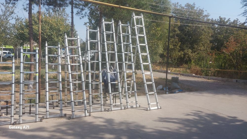 Стремянка телескопический.