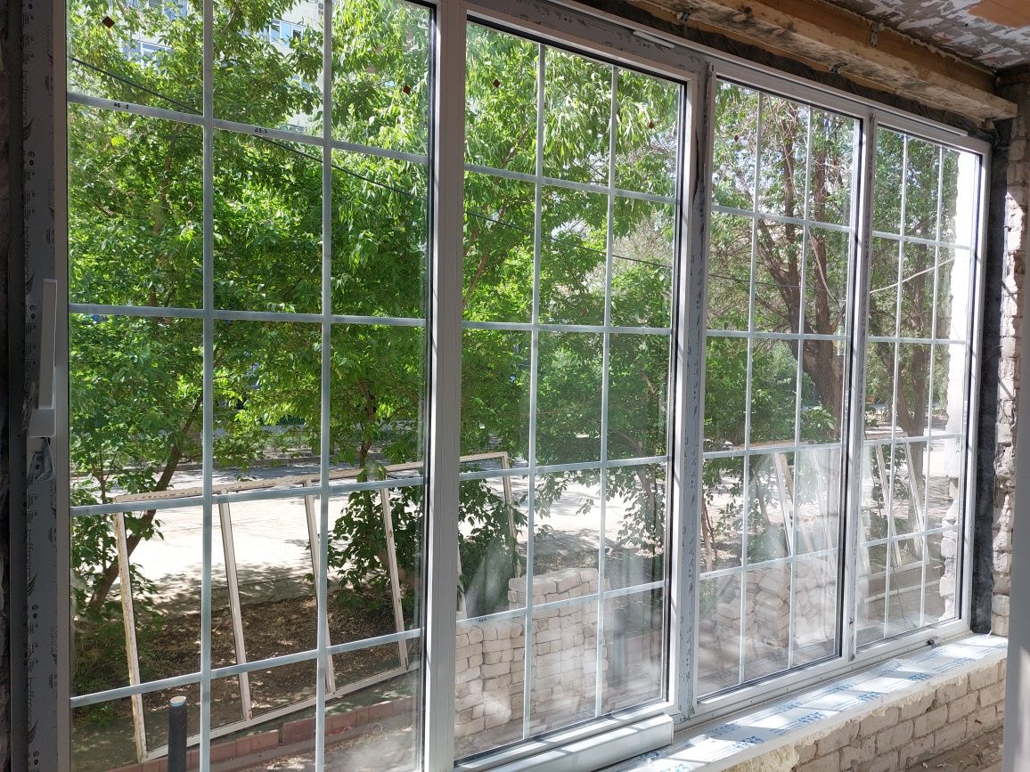 Окна пластиковые Алюминиевые окна,двери,перегородки и т.д