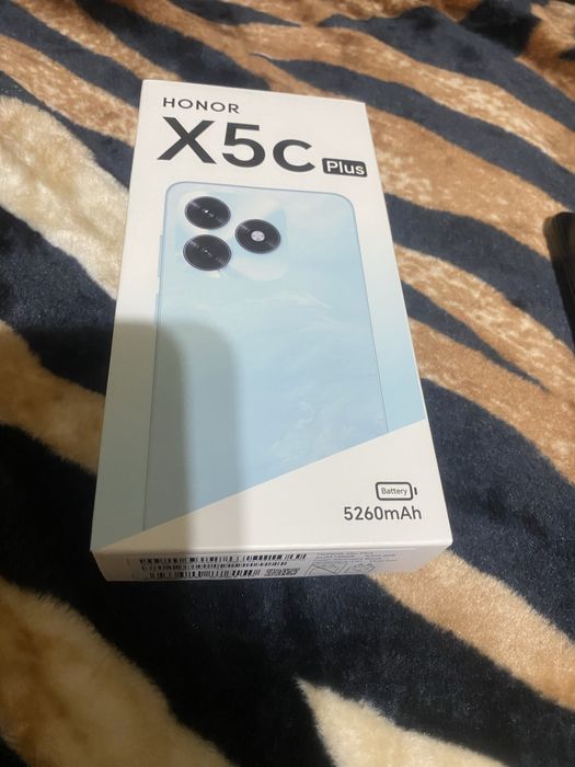 Honor x5c plus este nou