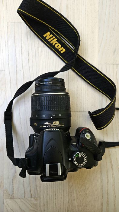 Nikon D3200l SLR camera with an 18-55mm VR lens.