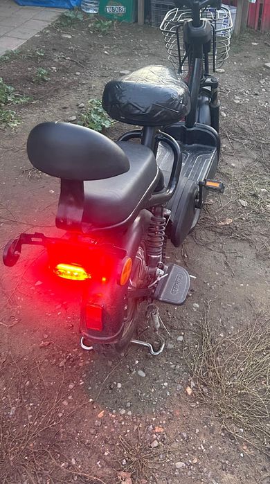 Scuter electric        .