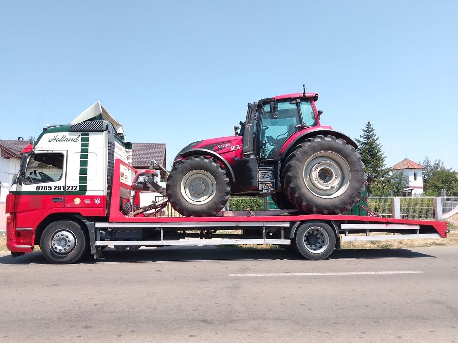 Transport Utilaje Teleorman încărcător frontal jcb cat merlot john dee