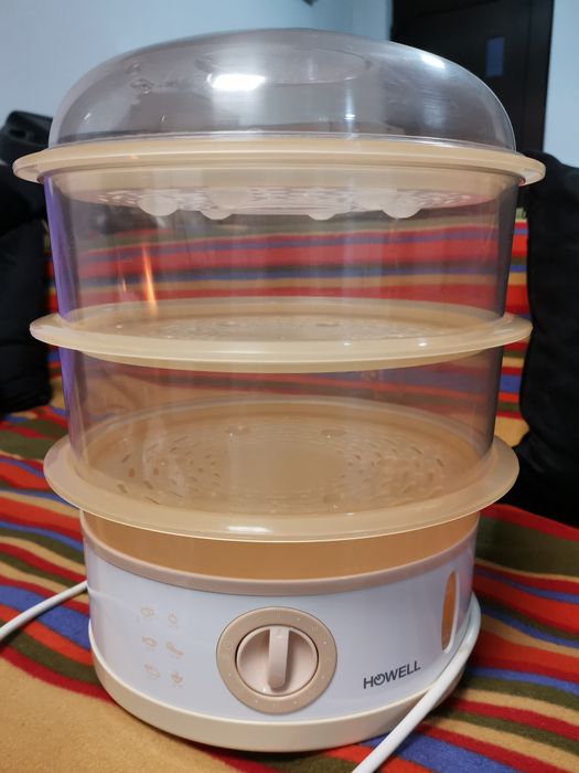 Aparat de gătit la abur cu ceas