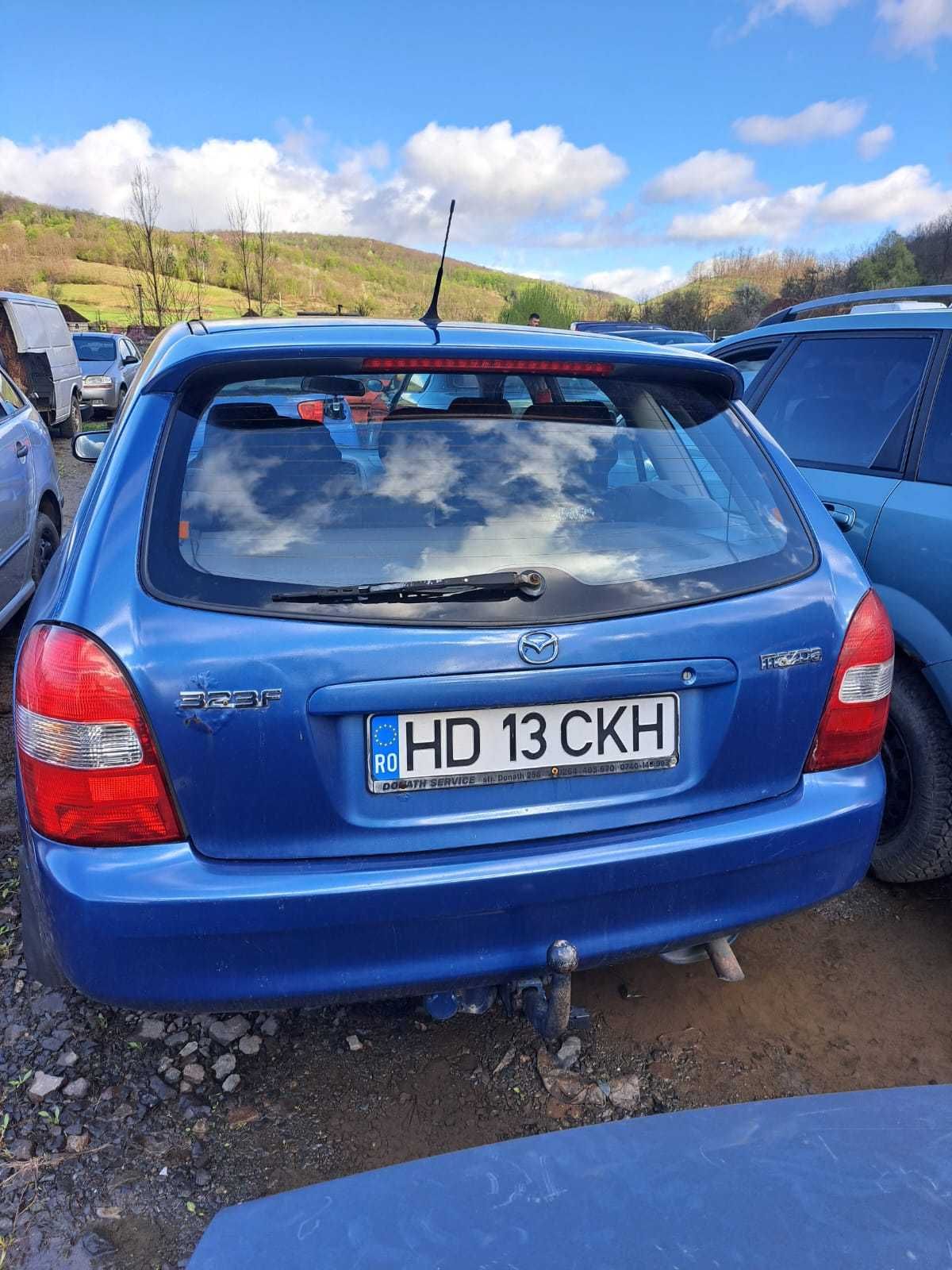 Dezmembrez Mazda 323 ,2.0 diesel an fabricație 2002