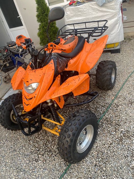 Vând atv shineray