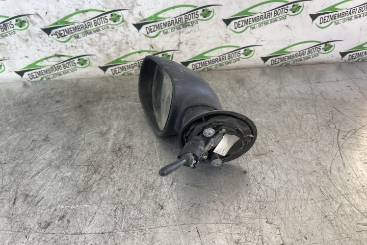 Oglinda stanga manuala E20103017 / E2 0103017 Dacia Logan prima gener