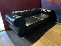 Продам диван в хорошем состоянии черного цвета
