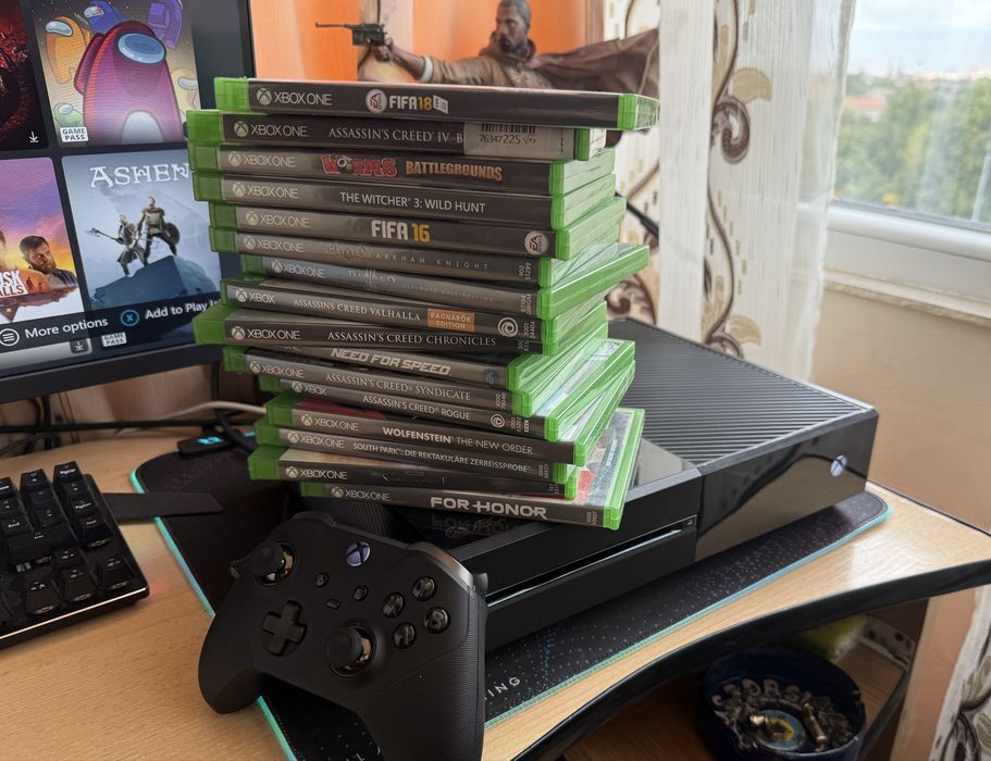 Xbox one cu 16 jocuri si 2 manete elite series 2