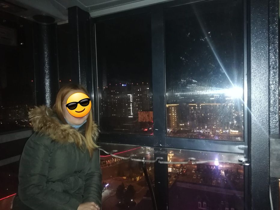 Зелёный зимний пуховик
