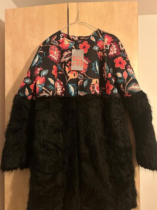 Vand haina de blana artificiala noua