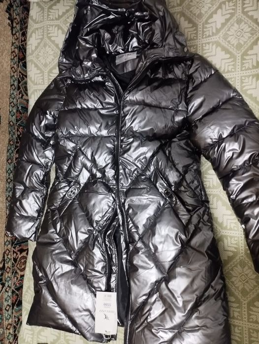 Зимний пуховик новый.