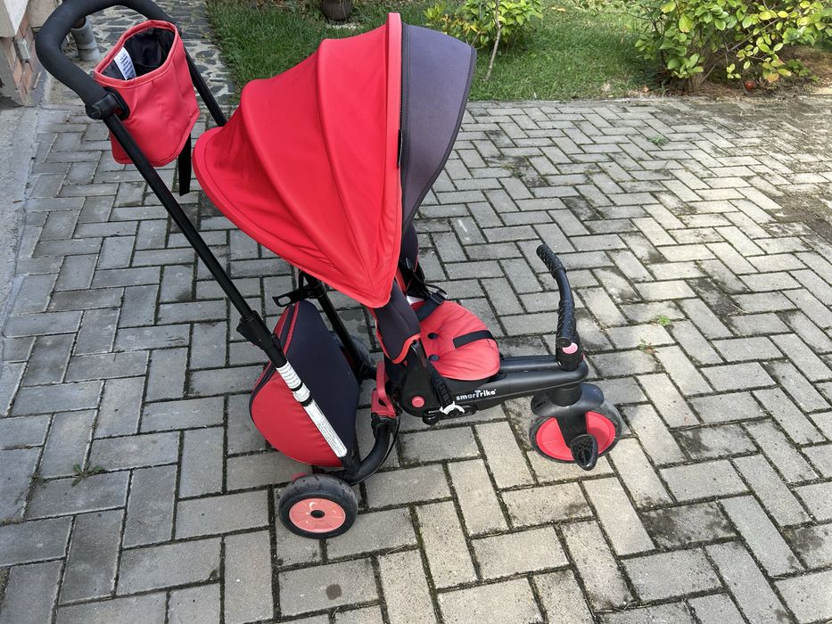 Vand SmarTrike tricicleta in stare foate buna cu accesori incluse