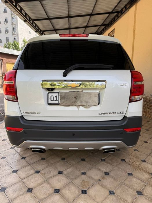 Captiva 2015 Yil o'zimniki Avtomat radnoy xolatda benzinda Oq sotiladi