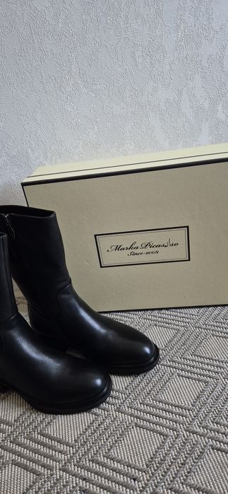 Продадам зимние сапоги..