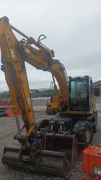 Vând excavator pe pneuri 13t, an 2005