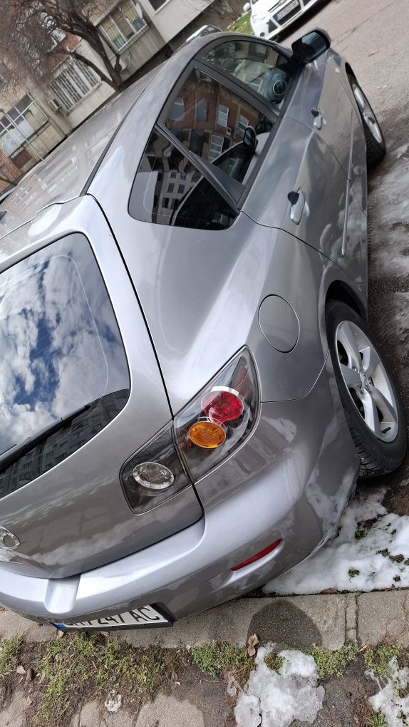 Mazda 3 бензин 1.6 + Lpg
