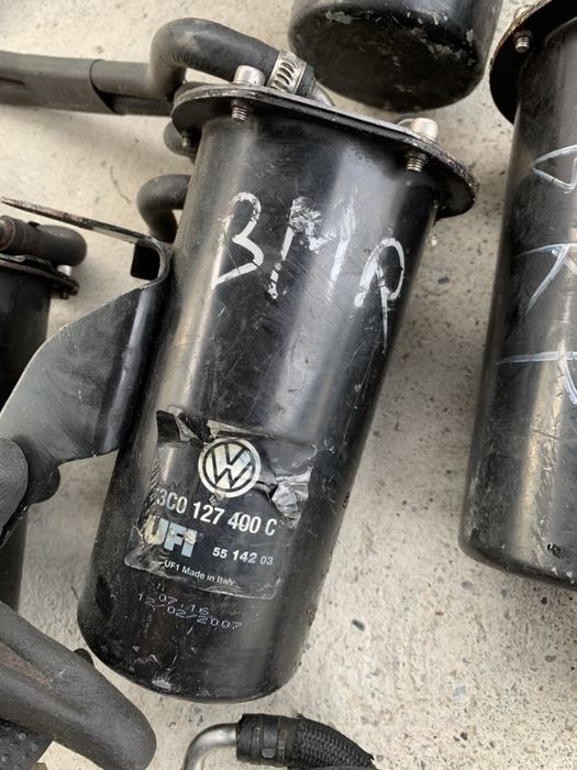 Carcasa filtru motorina pt passat b6,toruan,golf 5,etc