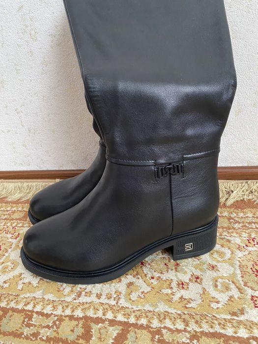 Продам новые сопоги натуральная кожа и мех хорошего качества