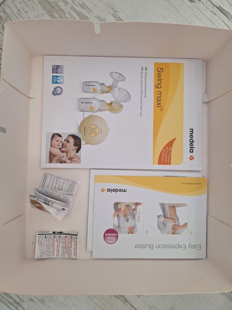 Помпа Medela swing maxi and calma