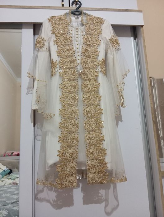 Kamplekt kalta ansambil razmeri 44-46holati yangi