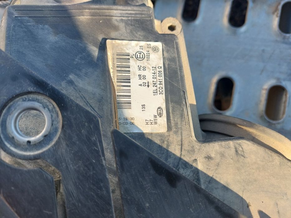 Far faruri halogen h7 vw Passat b6 berlina break Hella Europa