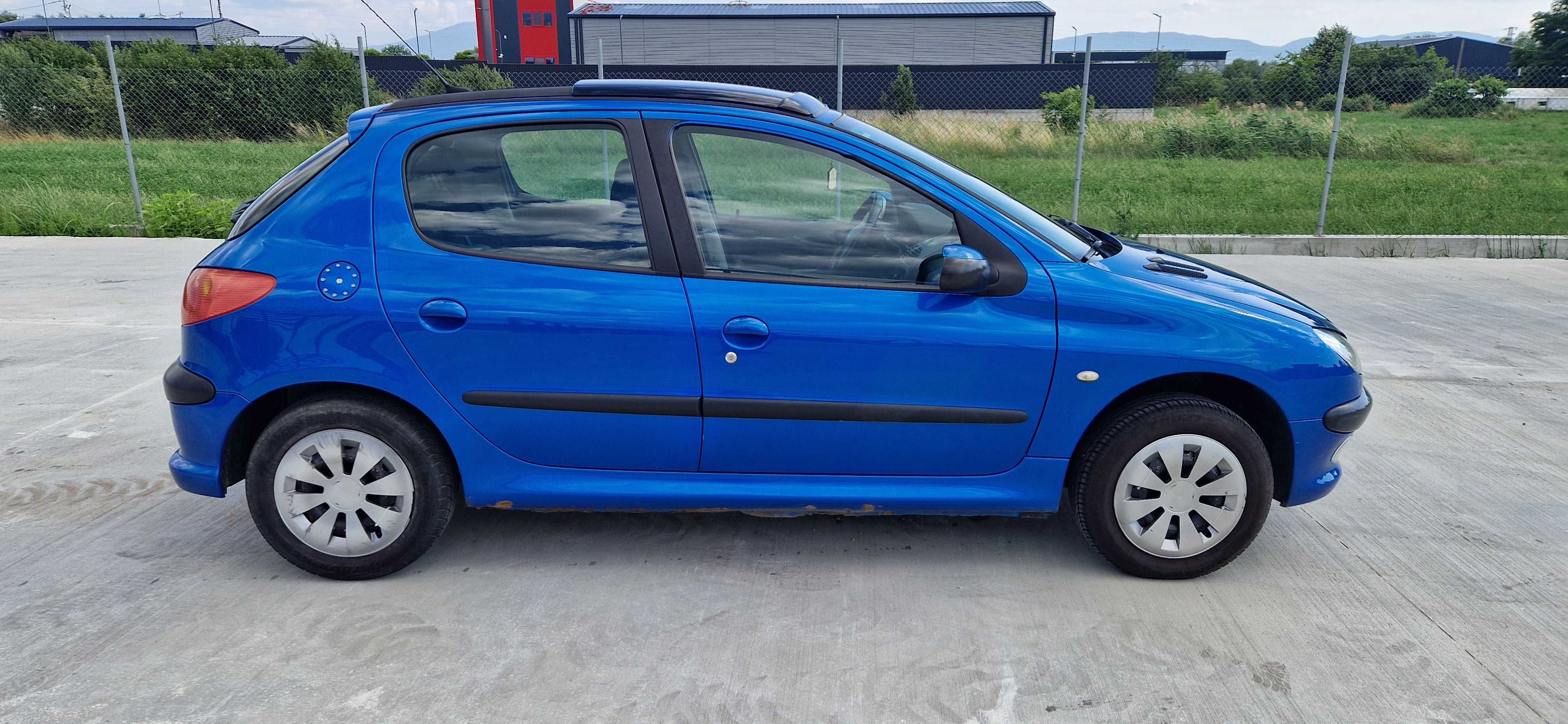 Peugeot 206 1.4 бензин