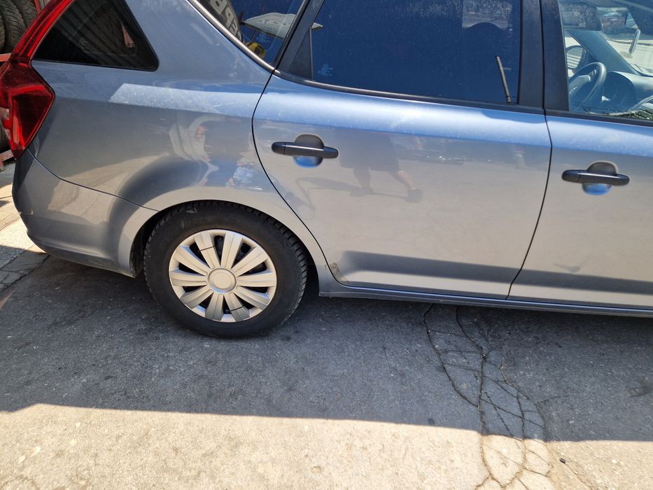 15цола оригинални железни джанти с гуми 195/65/15 и тасове за киа сийд