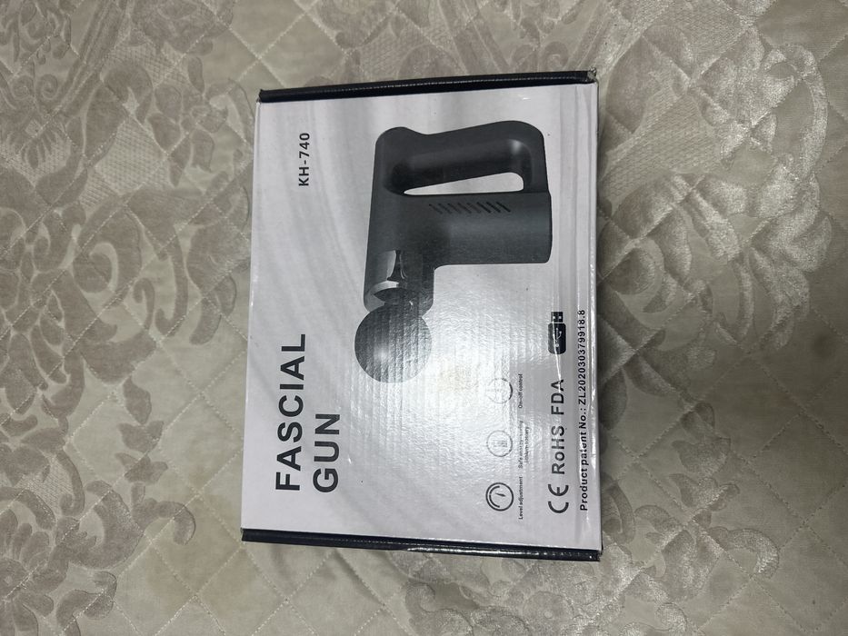 массажер-пистолет