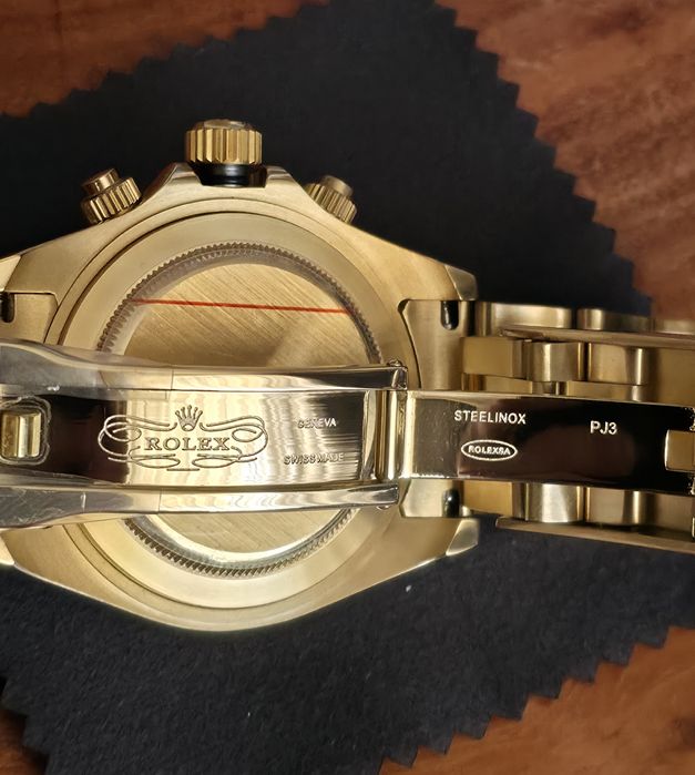Rolex daytona gold
