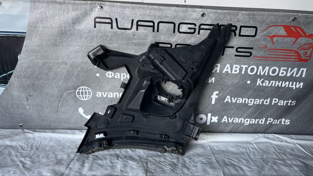 Ляв държач предна броня Renault Grand Scenic 3