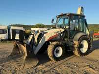 Buldoexcavator Terex 860 cupa multifuncțională brat extensibil picon