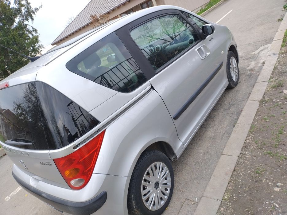 Vând sau Schimb Peugeot 1007 1.4 benzina