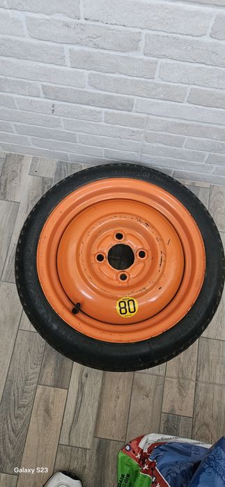 Roata rezerva slim de  Logan