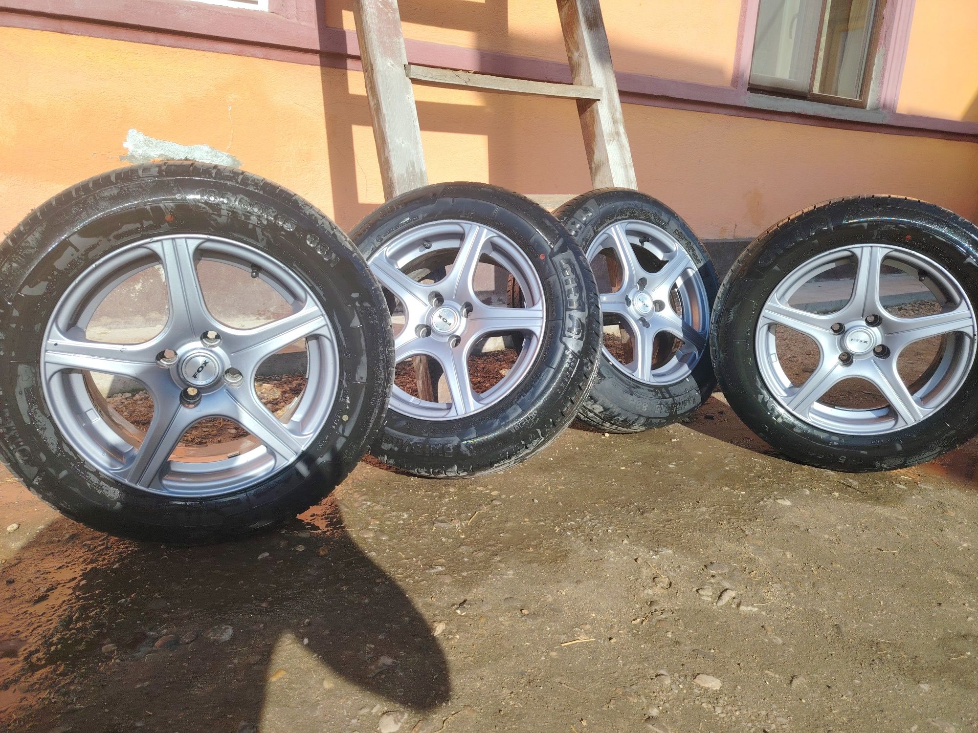 Jante 4x100 r15 cu cauciucuri de vara 185-65-r15 aproape noi