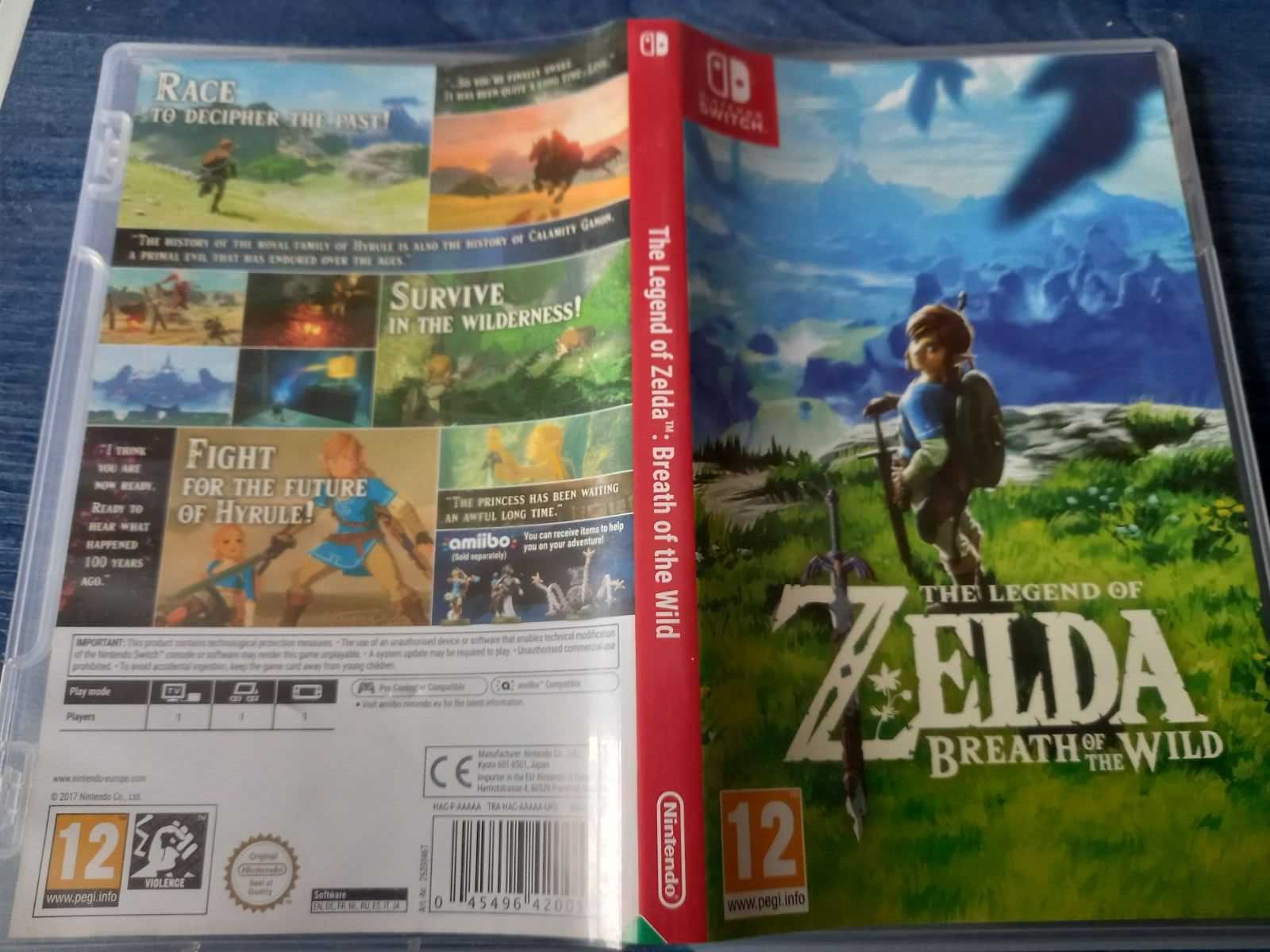 Nintendo Switch - Red & Blue + 2 Games