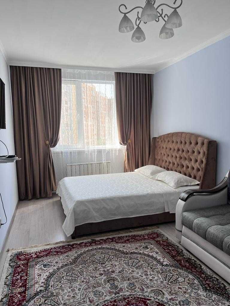 Уютная квартира напротив Алматы Арены, посуточно