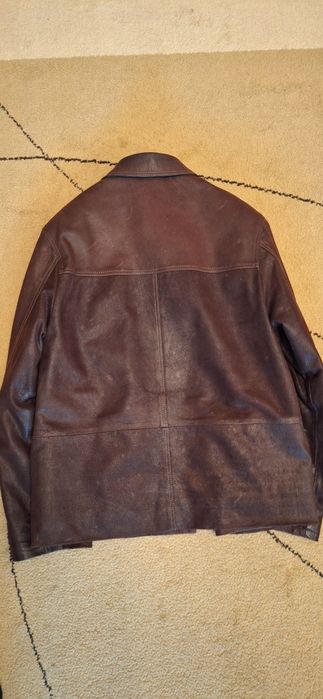 Haine și cojoc piele