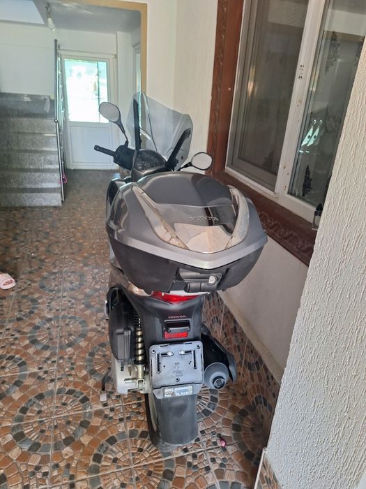 Vand sau schimb cu ATV..Honda sh 125i an fabricație 2016 km 7000