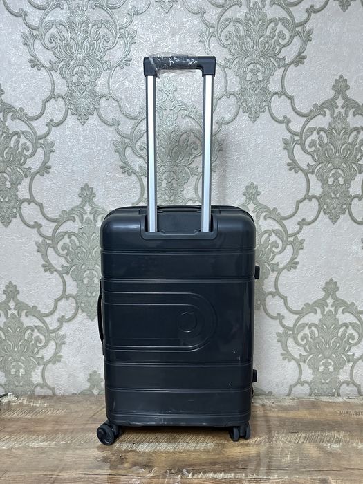 Чемодан 60 & 40 sm yangi ishlatilmagan