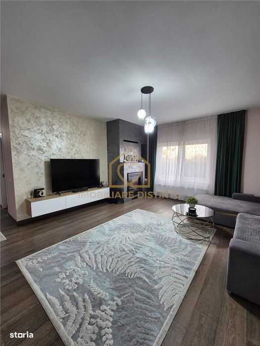 Casa pe nivel cu garaj si 6 ari teren in Sasar