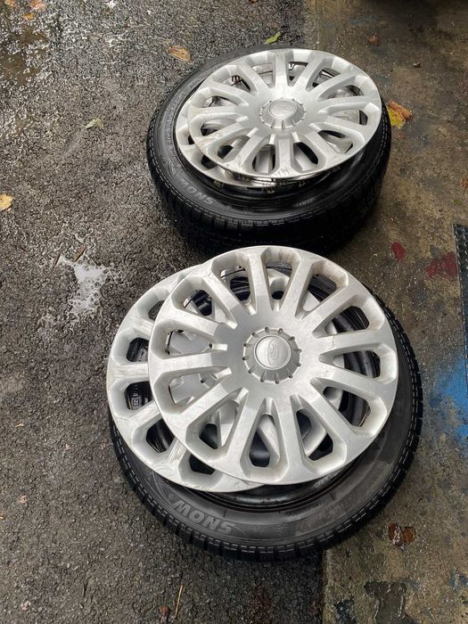 roti de iarna pentru ford cu jante de otel si capace de plastic