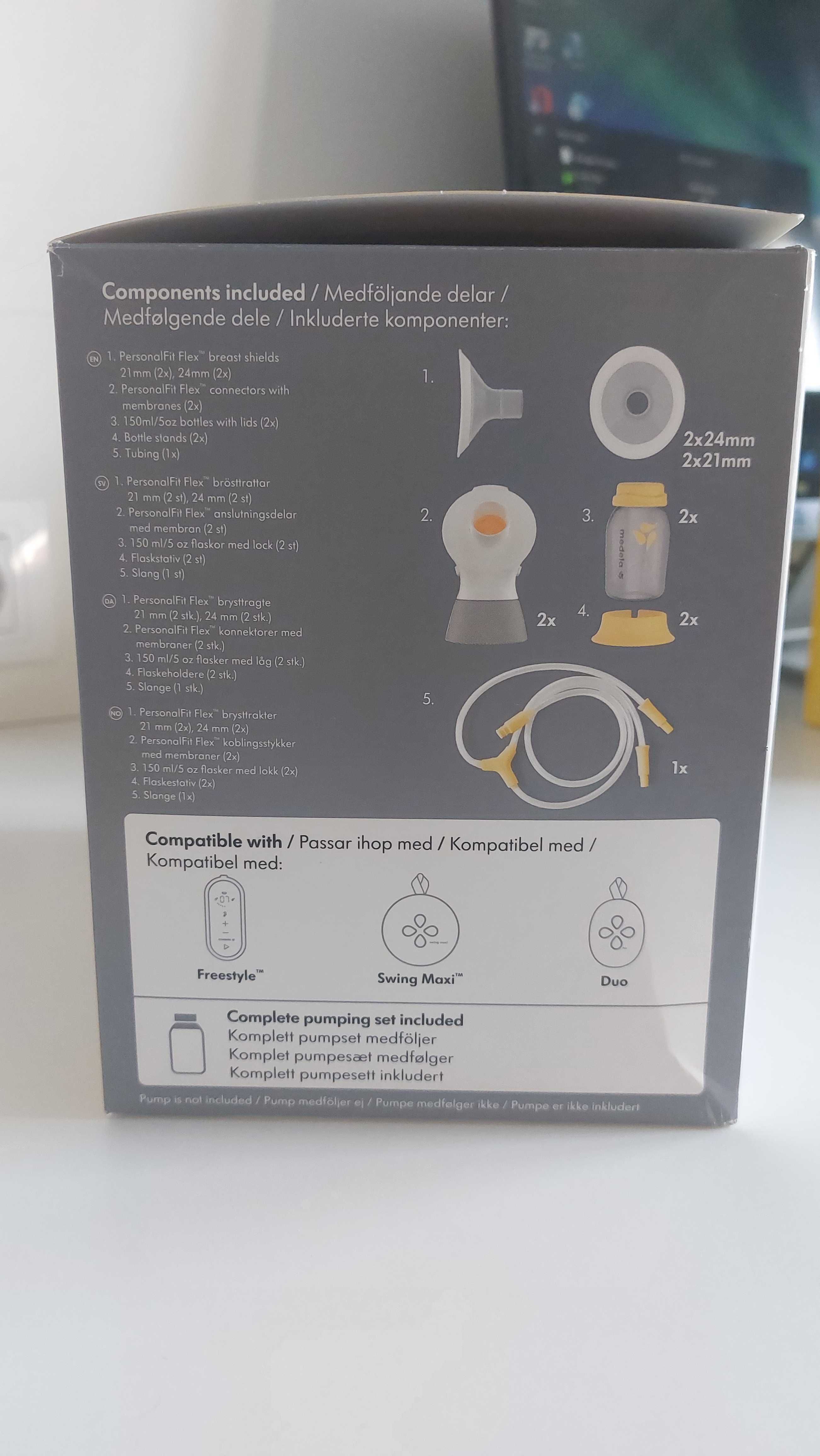 Двойна двуфазна помпа Medela Swing Maxi + допълнителни аксесоари