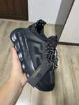 Versace chain reaction