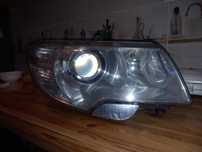 Far bixenon adaptiv dreapta si stanga skoda superb 2 2012