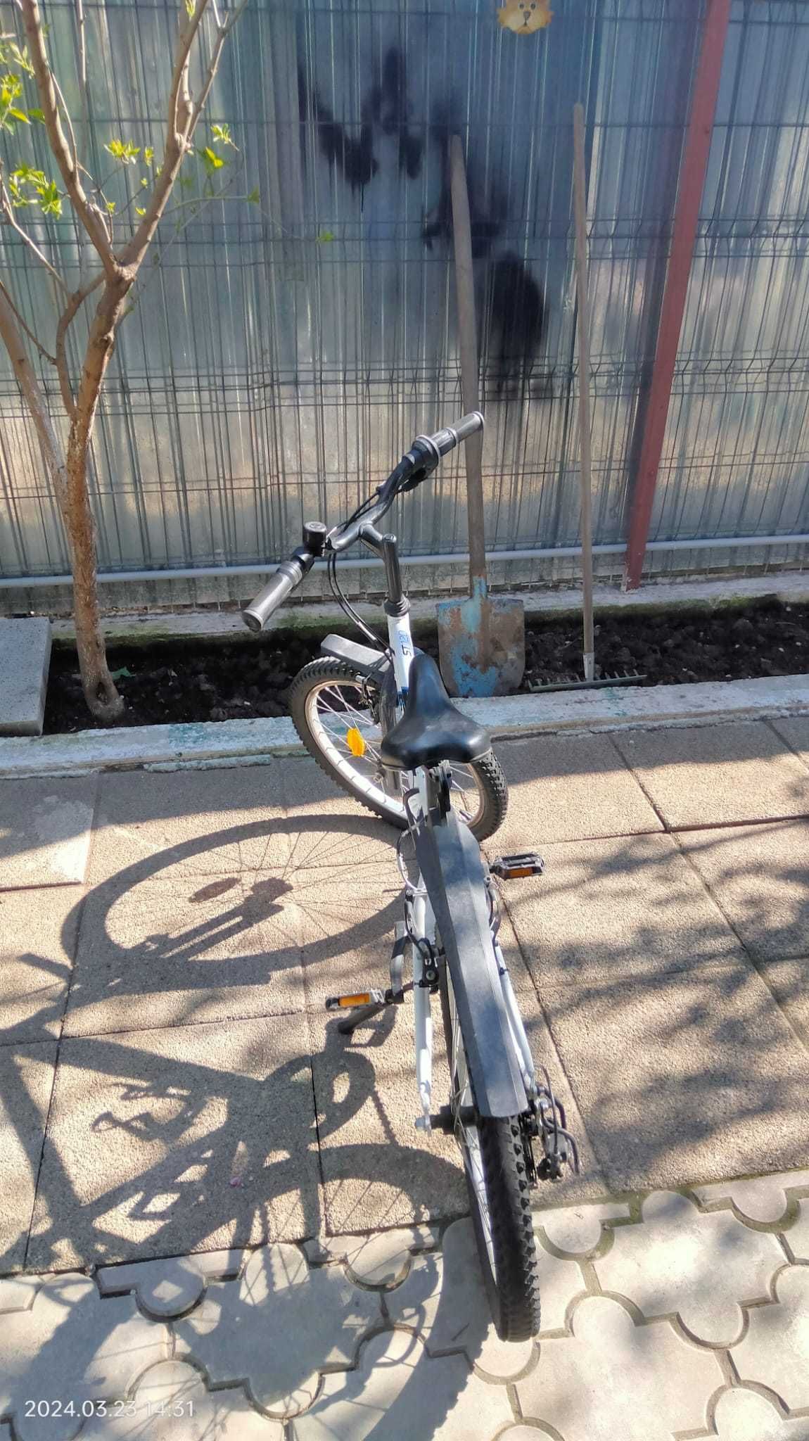 bicicleta 7- 10 ani (20'')