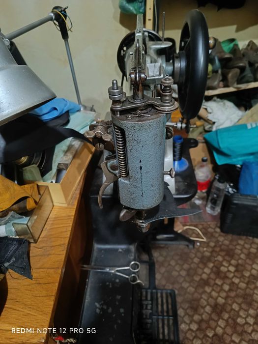 Mașină de cusut Singer