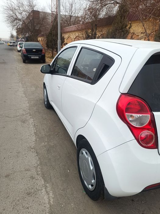 Спарк Оптима плйус машинаси сотилади холати яанги