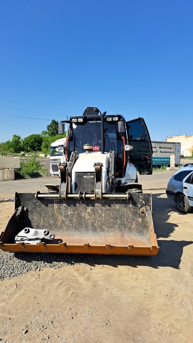 Услуги экскаватора погрузчика