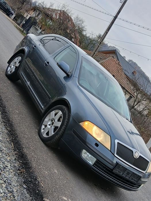 bara aripa use tragar capota grila far stop skoda octavia 2 2007