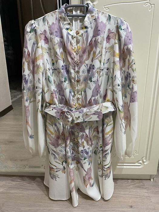 Платье в отличном состояние . 10000 тг.